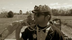 That time I kissed a rubber chicken at the Church Point Mardi Gras. 